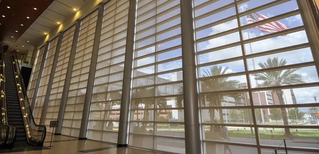 Commercial office building with automatic shades to control heat.
