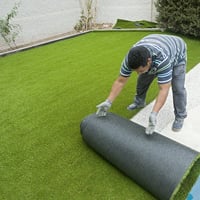 Rolling out artificial grass
